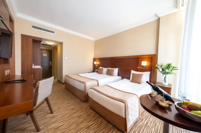 Salamis Bay Conti Resort Hotel & Casino Ammókhostos Rom bilde A room at the hotel